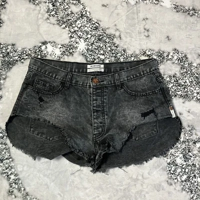 Pantalones cortos de una cucharadita para mujer talla 29 desteñidos negros grises botones mosca corte angustia Foto 1 de 4