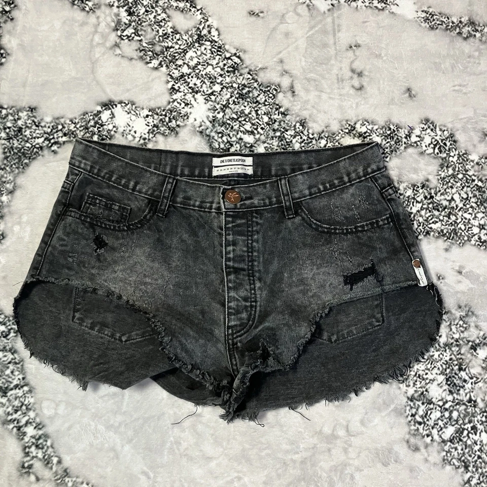 Pantalones cortos de una cucharadita para mujer talla 29 desteñidos negros grises botones mosca corte angustia Foto 1 de 4