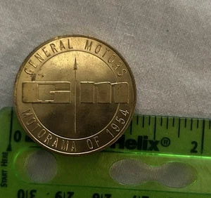 Moneda token vintage 1954 GM Motorama General Motors Chevy Pontiac Oldsmobile - Imagen 1 de 2
