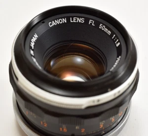 Sauberes Canon FL 50mm f/1.8 Prime Objektiv mit Canon UV Filter - Bild 1 von 4