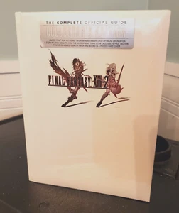 Final Fantasy XIII-2 Collector's Edition Hardcover Official Guide Book PS3 New - Bild 1 von 2