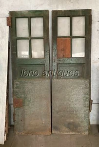 PAIR OF 1940s VINTAGE INDUSTRIAL WOODEN DOORS W/ GLASS PANES AND STEEL PLATES. - Picture 1 of 7
