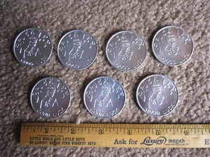 Lot of 7 ... ORIGINAL Bruce Lee GOOD LUCK coin token 1970's karate - Picture 1 of 3