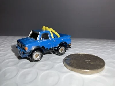 Vintage Galoob Micro Machines DATSUN 4x4 Off Road Pickup Blue Yellow Roll Bar - Image 1 of 4