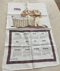Toalla de calendario vintage 1985 cachorros en canasta lino puro - Imagen 1 de 6