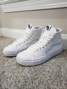white leather high top vans