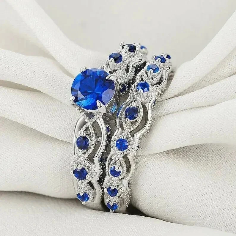 Juego de anillos de compromiso nupciales de oro blanco de 14 k de diamantes creados en laboratorio de corte redondo de 3 quilates FN Foto 1 de 3