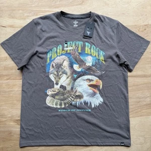 UA Under Armour M Project Rock Loose Fit Force Of Nature Concert Shirt Heavy - Picture 1 of 7