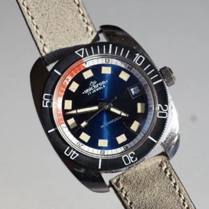 Reloj de buceo Unichron de colección para hombre tono plateado esfera azul fecha 17 joyas automático funciona - Imagen 1 de 19
