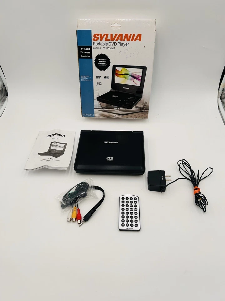 Sylvania SDVD7014 Negro 7" Pantalla LCD Portátil Reproductor de DVD Control Remoto Adaptador de CA FUNCIONA Foto 1 de 4