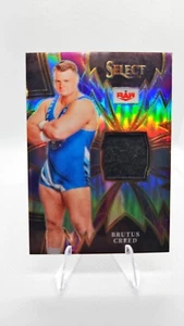 2024 Panini Select WWE Brutus Creed Relic Sparks #SP-BCR JS - Picture 1 of 2