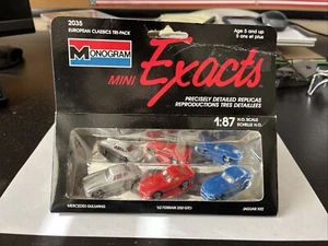 MONOGRAMA MINI EXACTS 2035 JUEGO DE 3 COCHES 62 FERRARI, JAGUAR XKE, MERCEDES NUEVO EN CAJA - Imagen 1 de 1