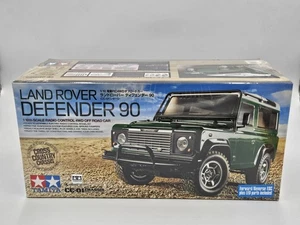 Tamiya Modellbau Land Rover Defender 90 CC-01 Maßstab 1:10 Item 58657 Neu Folie - Bild 1 von 9
