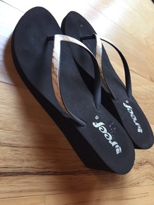 reef animal print flip flops