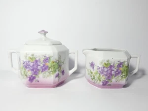 JUEGO AZUCARERO DE PORCELANA ALEMANA VINTAGE/CON TAPA Y CREMA FLORES VIOLETAS - Imagen 1 de 15