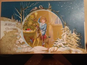 c1905 Christmas Postcard Boy on Rocking Horse Clear Glitter Serie 325 - Picture 1 of 2