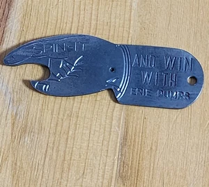 VINTAGE ALL METAL SPIN-IT AND WIN WITH ERIE GAS PUMPS BOTTLE OPENER 3.25" - Picture 1 of 2