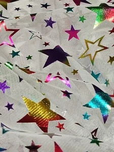 tessuto velo con stelle fluorescenti - Foto 1 di 1
