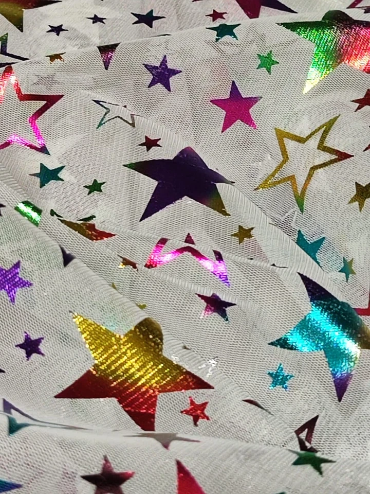 tessuto velo con stelle fluorescenti - Immagine 1 di 1