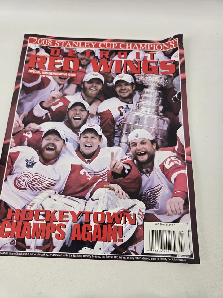 Detroit Red Wings Crystal Pucks And Magizine - Image 1 of 4