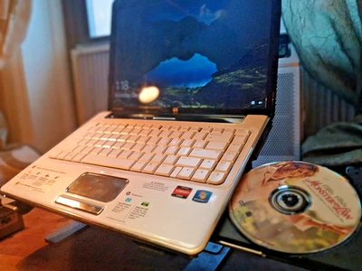  HP Pavilion dv4-2145dx : AMD Turion II Dual Core M520 2.3GHZ , 4GB / 120G - image 1 of 4