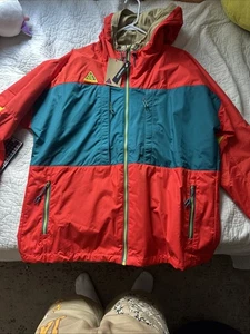 Nike Men’s NSW ACG Anorak Hood Jacket Habanero Red/teal/beige Medium - Picture 1 of 6