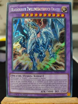 BLAUÄUGIGER ZWILLINGSAUSBRUCH-DRACHE - SHVI-DE099 Secret Rare / 1. Auflage NM - Bild 1 von 2