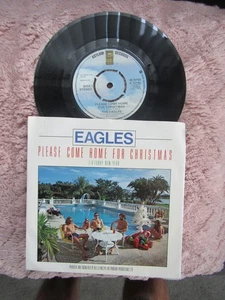EAGLES PLEASE COME HOME FOR CHRISTMAS / FUNKY NEW YEAR asylum 13146 EX - Picture 1 of 3