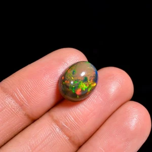 Schwarzer Opal Cabochon 4,5 kt Atemberaubendes Farbspiel! Perfekt für Schmuck - Bild 1 von 3