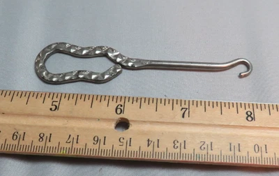 Extractor de herramientas de gancho de bota de zapato con botón antiguo Foto 1 de 2