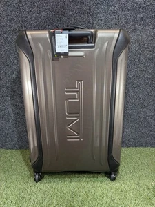 Tumi Vapor 30” Large Trip Packing Hardcase Spinner Luggage Gold Carbon NWT $875 - Picture 1 of 17