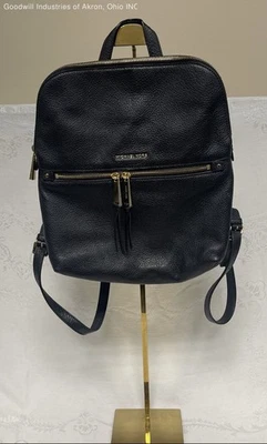 Mochila mediana Michael Kors de cuero granulado negro herrajes dorados certificado de autenticidad Foto 1 de 4