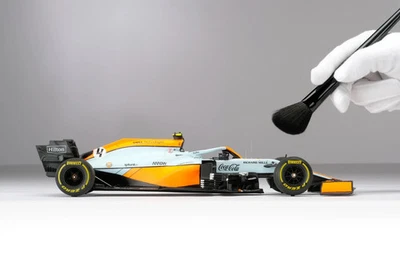 Amalgama Escala 1:18 Fórmula 1 - McLaren MCL35M 2021 - Lando Norris - Gulf F1 Foto 1 de 4