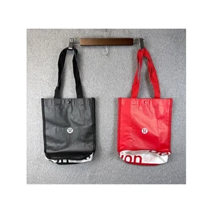 2x Lululemon wiederverwendbare Einkaufstasche Beuteltasche schwarz & rot Logo Alltag Tragetasche - Bild 1 von 8