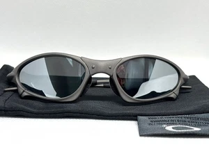 Oakley Penny x Metal Titanium Silver Black Iridium Polarised Sunglasses - Picture 1 of 5