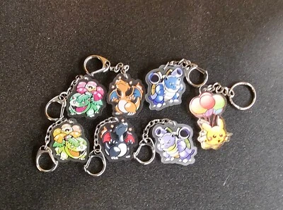 Shiny Charizard, Blastoise, Venusaur, Pikachu double-sided charms (4) Set - Image 1 of 4