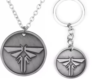 Collana e Portachiavi The Us – Joel & Ellie con Lucciola/Firefly Colore Argento - Foto 1 di 8