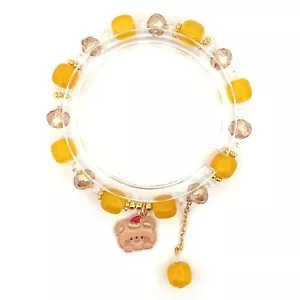 BOWS Yellow Glazed Clear Crystal Beads Elastic Bracelets Christmas Bear Charm - Picture 1 of 2