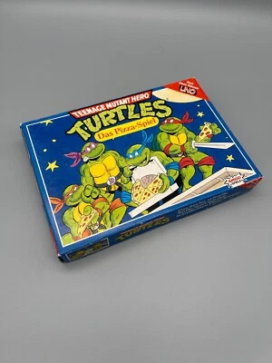 Amigo Spiel: 1990 Teenage Mutant Turtles Das Pizza Spiel komplett ohne Anleitung - Bild 1 von 4