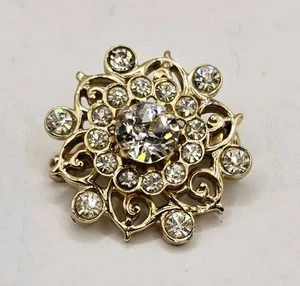 Broche Karu dorado estrás flor/estrella - Imagen 1 de 3