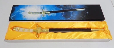 Espada Daga Decorativa ACERO INOXIDABLE Hoja Dorado, Blanco y Negro con Funda Foto 1 de 4