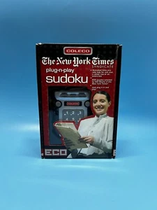 Coleco The New York Times Sudoku Plug & Play für Fernseher mit Cinchbuchsen (KOSTENLOSER VERSAND - Bild 1 von 3
