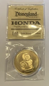 Innovaciones Disneyland, Honda Asimo, medallón de bronce W. Orig. embalaje, NOS - Imagen 1 de 8