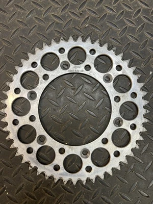 Piñón trasero de aluminio Honda Renthal 49T 1983-26 CR125 CR250 CR500 CRF250 CRF450 Foto 1 de 3