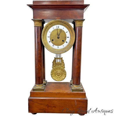 Antiguo reloj pórtico imperio francés bronce corre columnas años 1840 caoba clásico Foto 1 de 4
