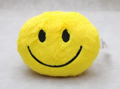 American Girl A yellow smiley-face faux-fur pillow for 18'' doll Nicki’s Bed