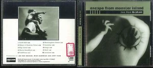 JON DEE GRAHAM ESCAPE FROM MONSTER ISLAND 1997 CD OTTIMO USATO - Imagen 1 de 1