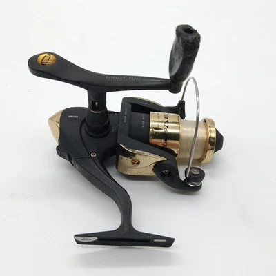 Carretel giratório Mitchell Outrigger OR2000 7 rotores balanceados 8 lb/125 yd - Imagem 1 de 4