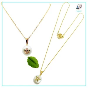 Collana da donna in acciaio dorato perla madreperla e stella con zirconi - Picture 1 of 5