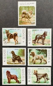 LAOS DOGS STAMPS SET OF 7 MNH 1986 BERNESE ELKHOUND BORDER COLLIE KEESHOND DOG - Picture 1 of 1